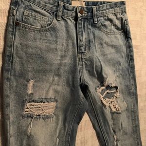 Men's Blue Jean w/ Flower Design on Back. 30”x 30”